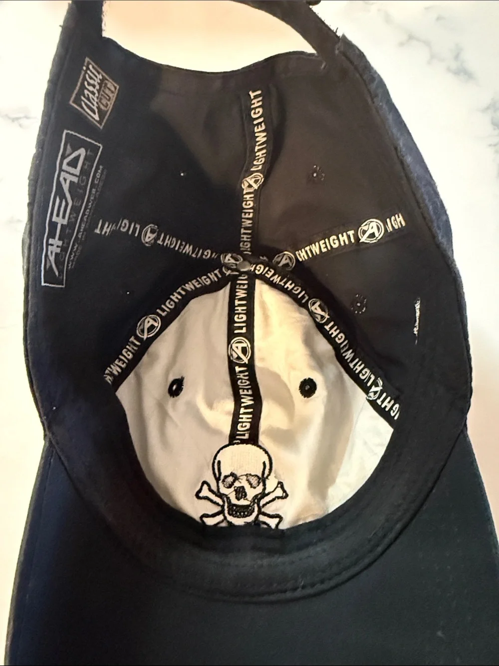 Black Skull & Crossbones Winged Foot Logo Golf Cap